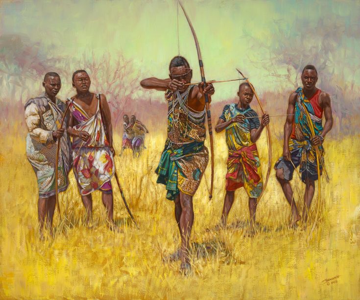 Hadzabe hunter with traditional bow and arrows in Tanzania savanna