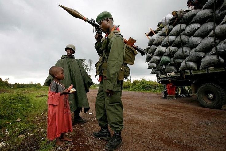 M23 rebel fighter holding a rocket launcher in Congo.