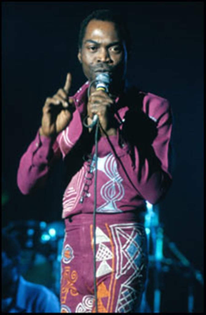 Iconic image of Fela Kuti with his trumpet, showcasing his persona and style.
