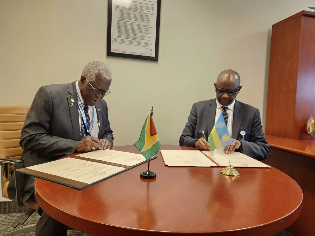 Diplomatic representatives from Rwanda and Guyana formalize air transport cooperation.