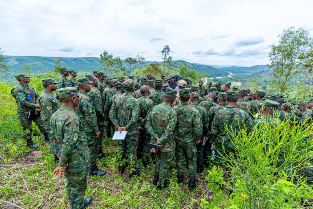 RDF students listening to retired officers during their visit to Mulindi Liberation Museum